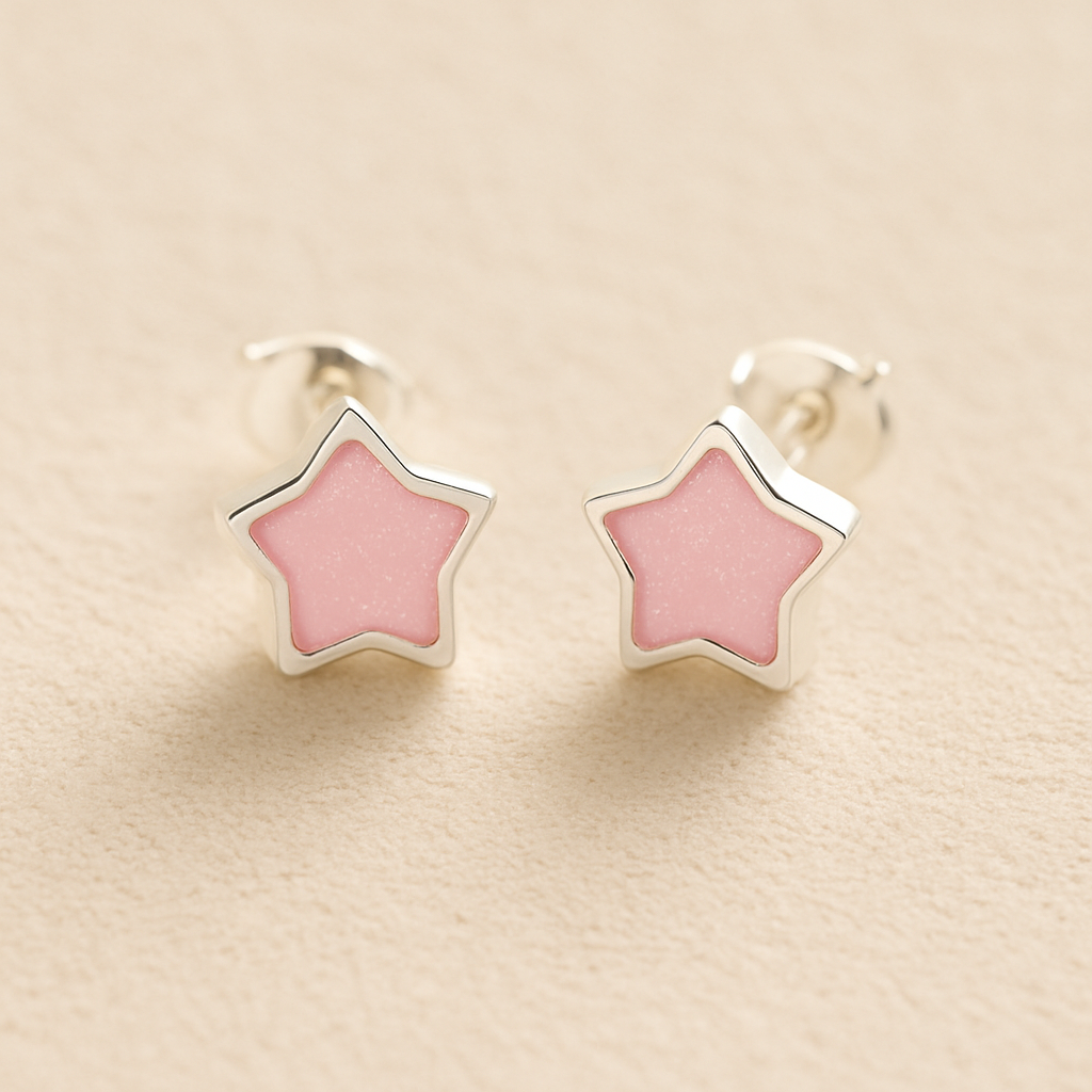 Silver Memorial Star-Shaped Ashes Earrings with light pink resin on a beige background