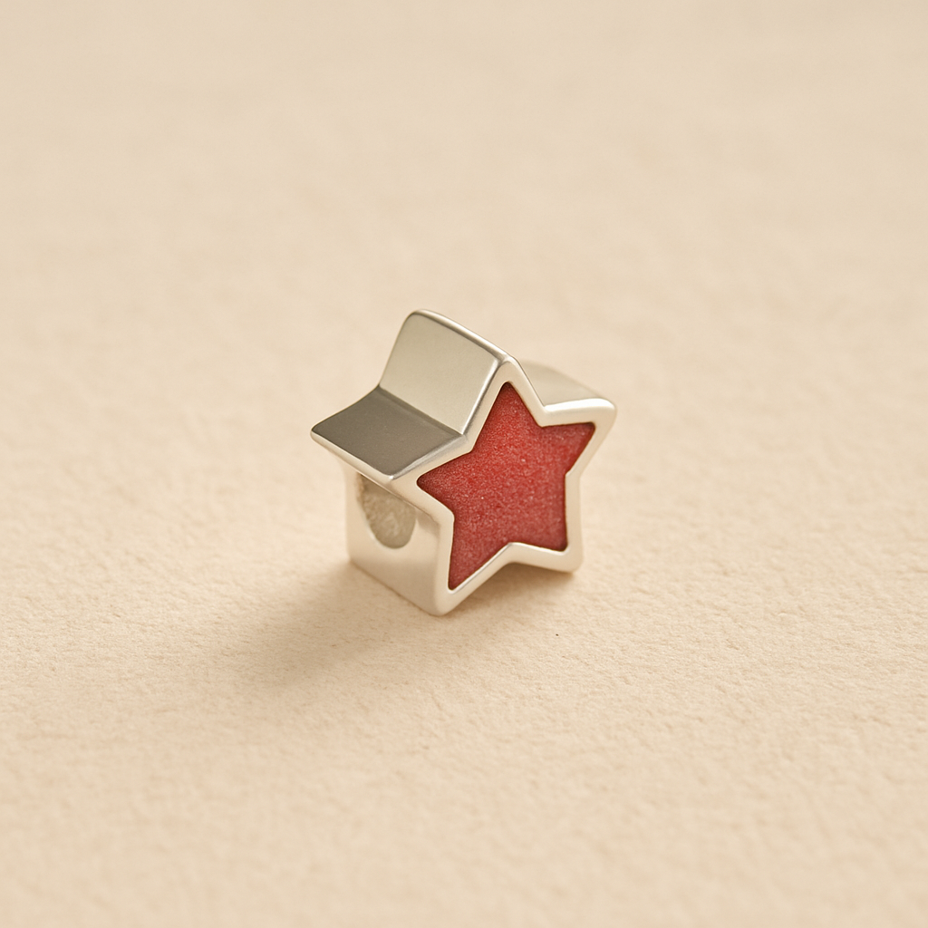 Silver star-shaped Memorial Charm Bead with dark pink resin on a beige background