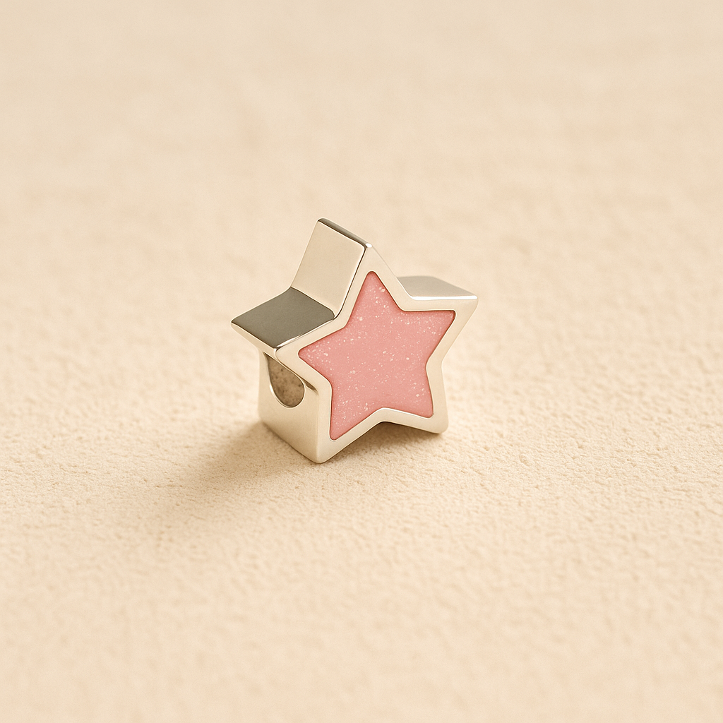 Silver star-shaped Memorial Charm Bead with light pink resin on a beige background