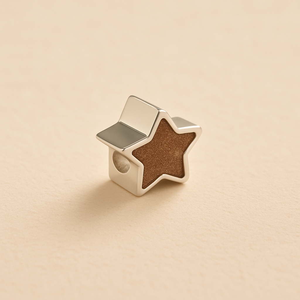Silver star-shaped ashes Charm Bead with mocha resin on a beige background