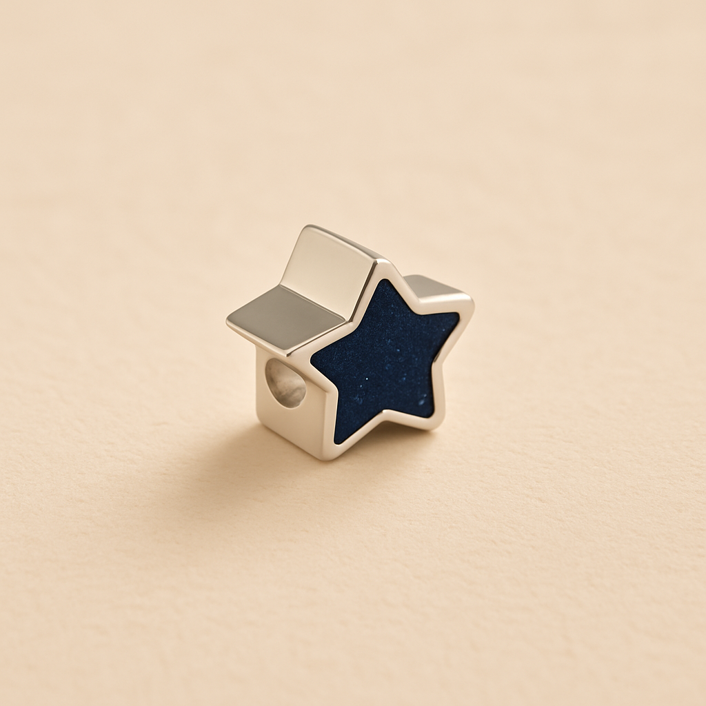 Silver Memorial Star Charm Bead with navy resin on a beige background