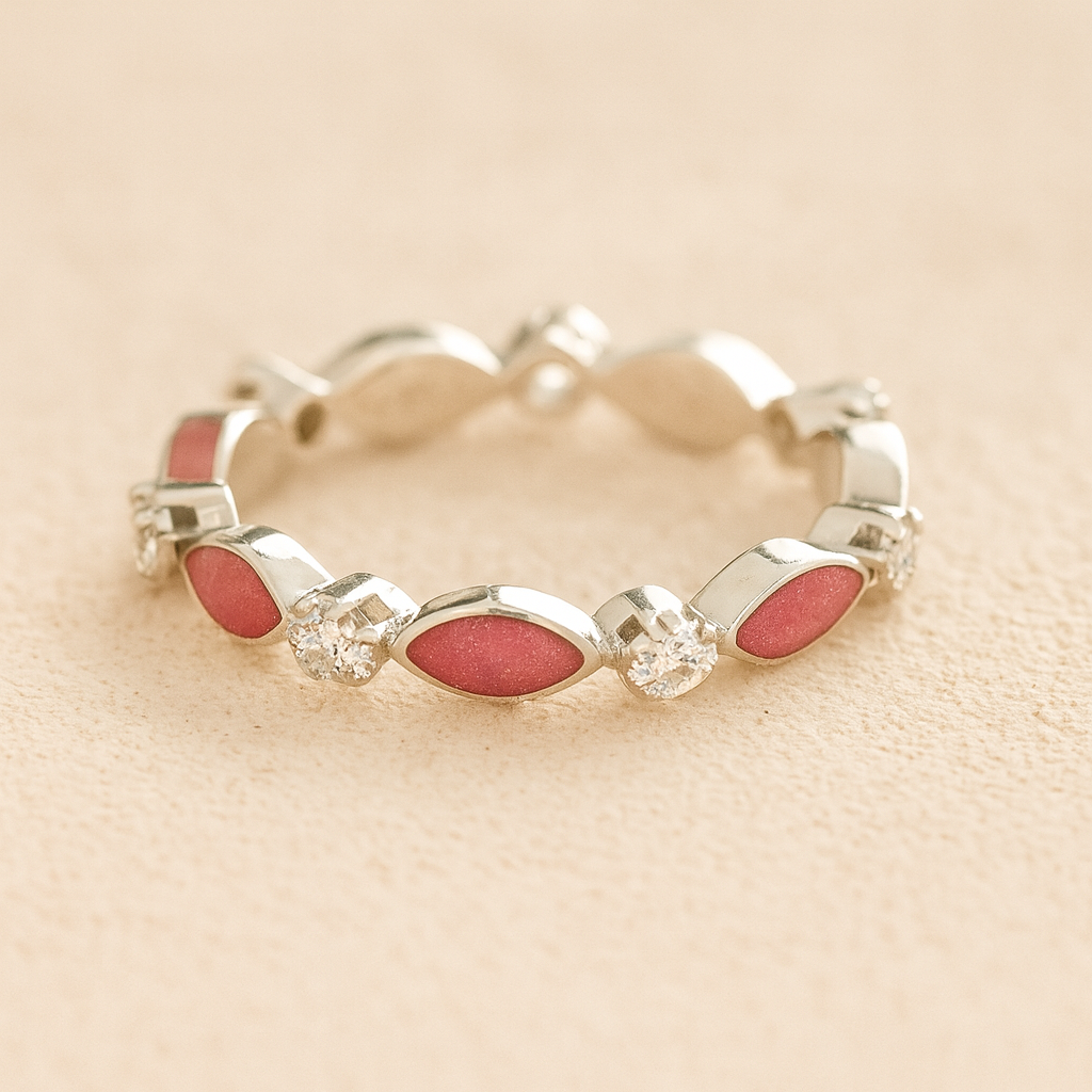 Silver cremation ashes ring with dark pink resin and crystal accents, filled with ashes or fur, displayed on a soft beige background – suitable for pet or human memorials.