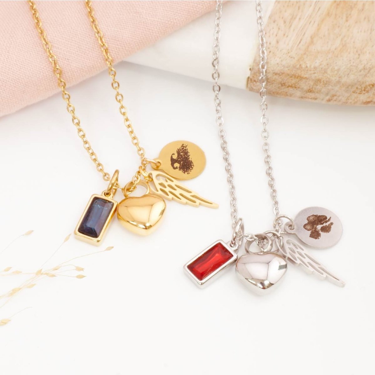 Two memorial necklaces with nose print engraving and paw print engraving on charms with self fill pendant and birthstone charms