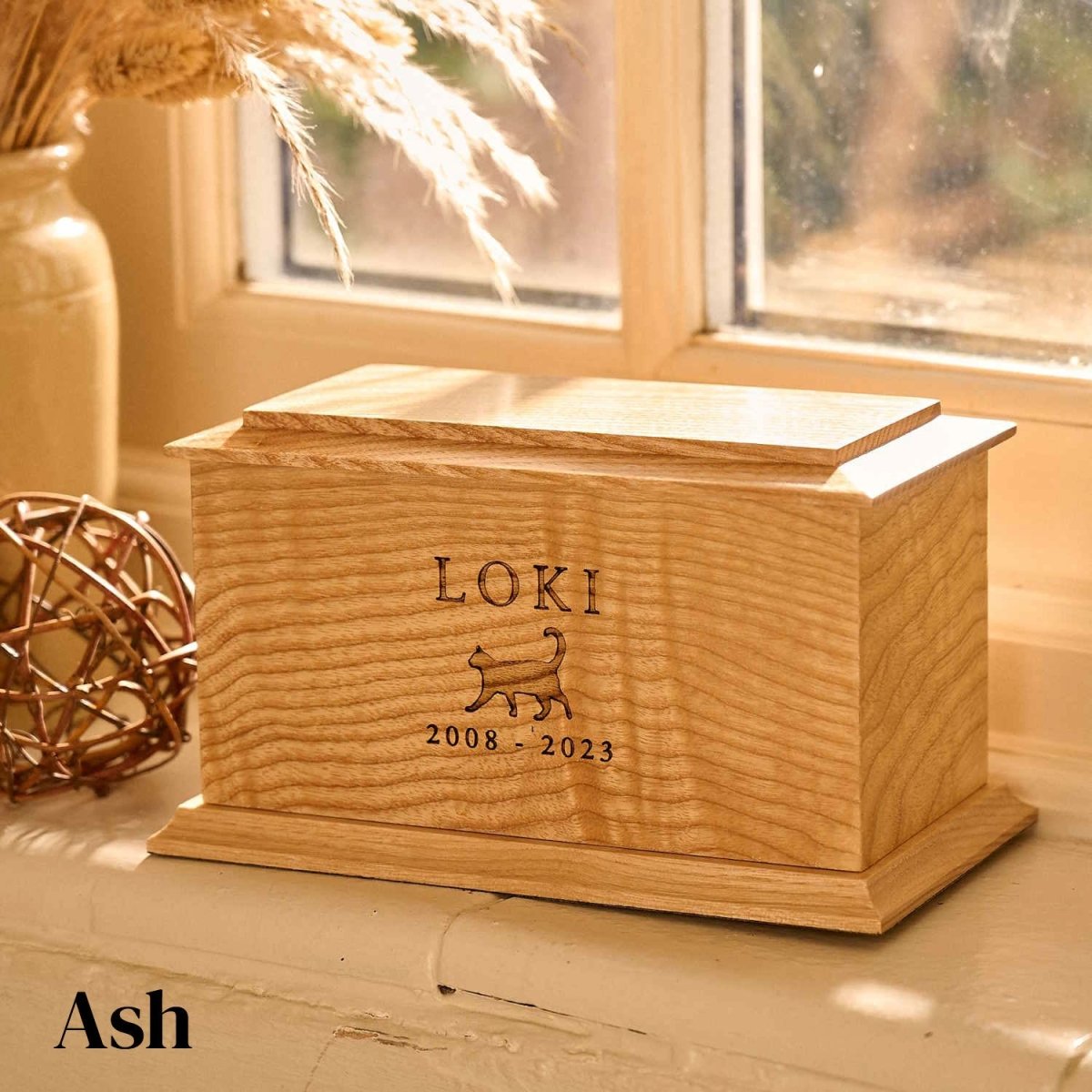 Ash wood cat urn with engraved name Loki and cat outline – custom wooden cremation urn for feline ashes