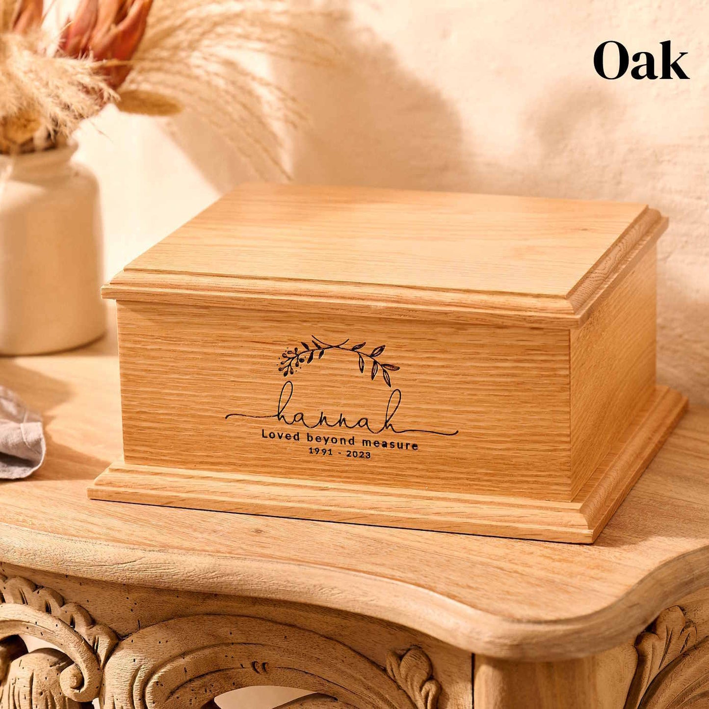 Personalised oak wood cremation urn with laurel wreath engraving – handcrafted wooden memorial urn for ashes