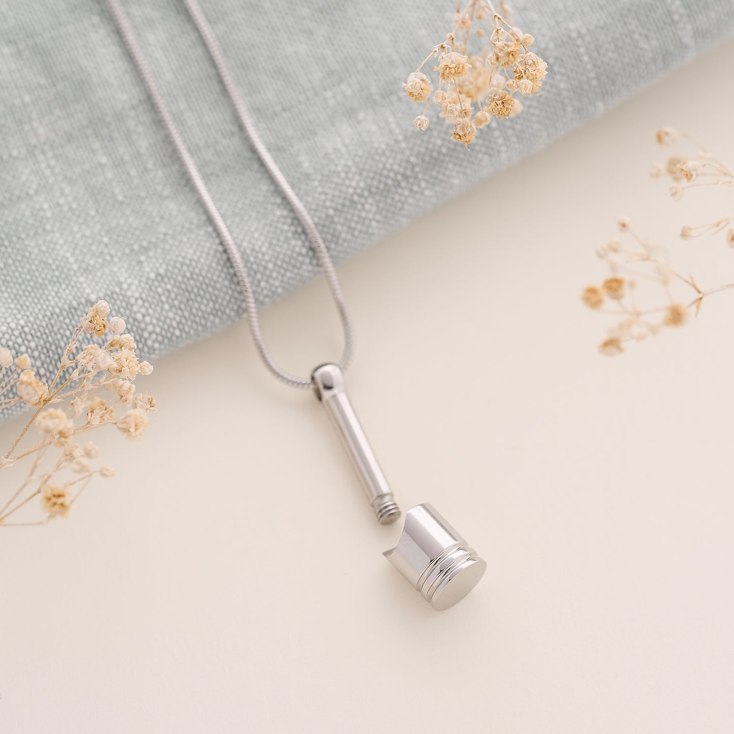 Urn Pendant for Ashes with Engine Piston Design in stainless steel