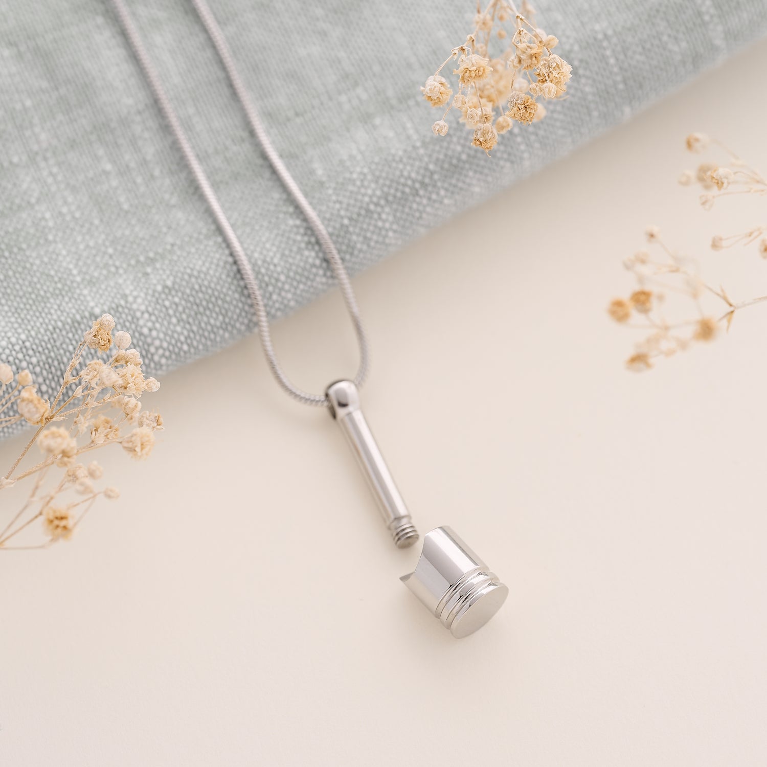 Urn Pendant for Ashes with Engine Piston Design in stainless steel