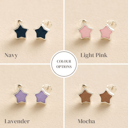 Star-shaped ashes earrings in navy, light pink, lavender and mocha on a beige background.