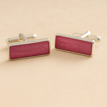 Silver Square Rectangle Memorial Ashes Cremation Cufflinks with Dark Pink resin, filled with ashes or fur, displayed on a soft beige background – suitable for pet or human memorials.