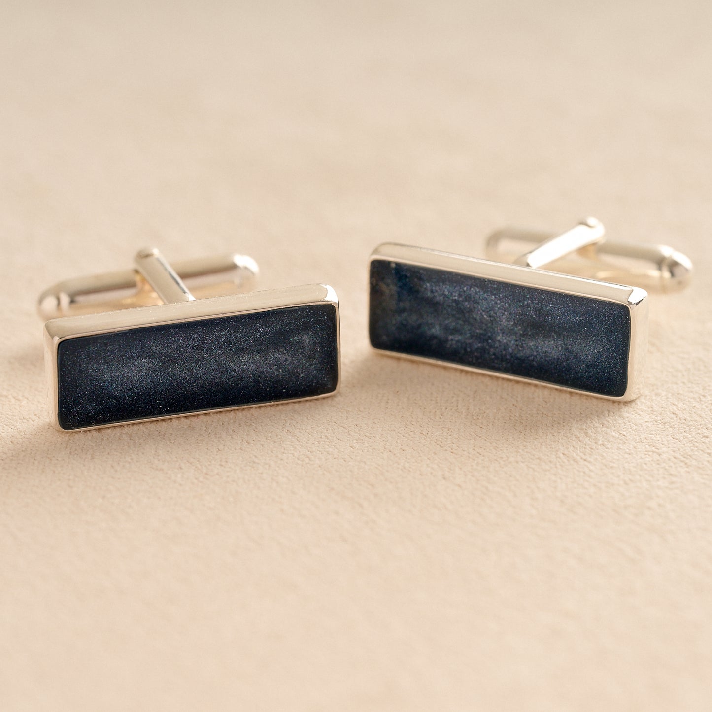 Silver Square Rectangle Memorial Ashes Cremation Cufflinks with Navy resin, filled with ashes or fur, displayed on a soft beige background – suitable for pet or human memorials.