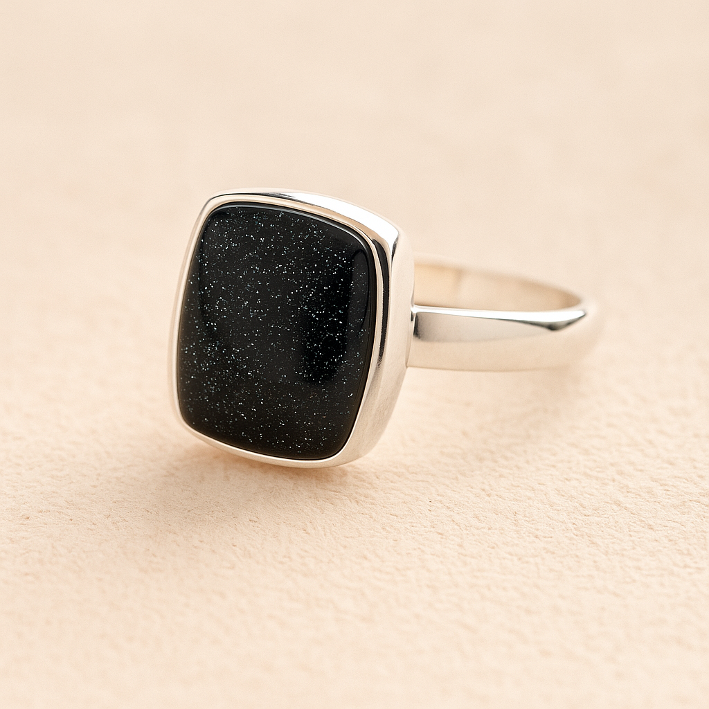 Silver Square Memorial Ashes Cremation Ring with black resin, filled with ashes or fur, displayed on a soft beige background – suitable for pet or human memorials.