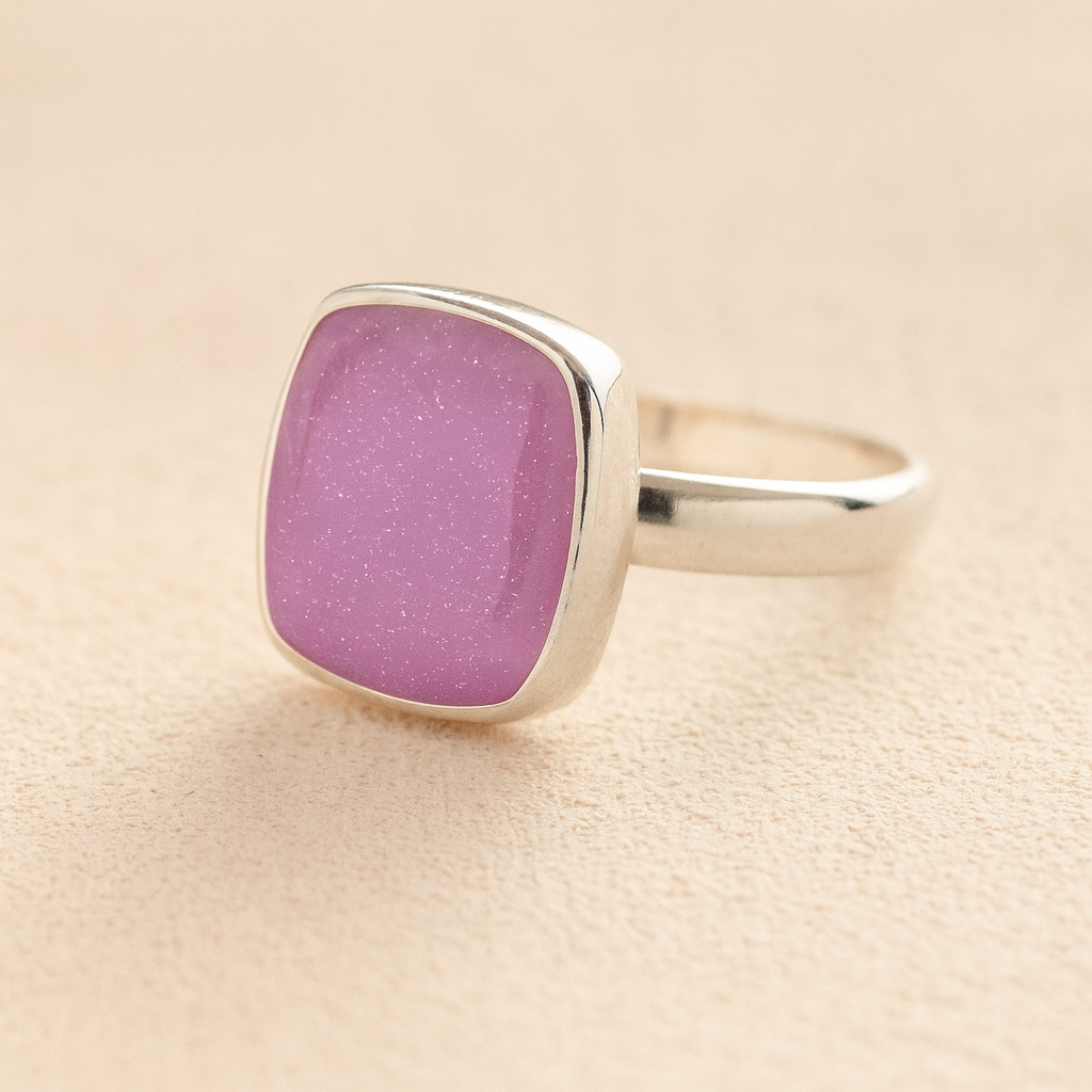 Silver Square Memorial Ashes Cremation Ring with lavender resin, filled with ashes or fur, displayed on a soft beige background – suitable for pet or human memorials.