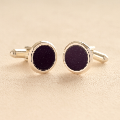 Silver Round Ashes Cufflinks with purple resin with ashes or fur on a beige background