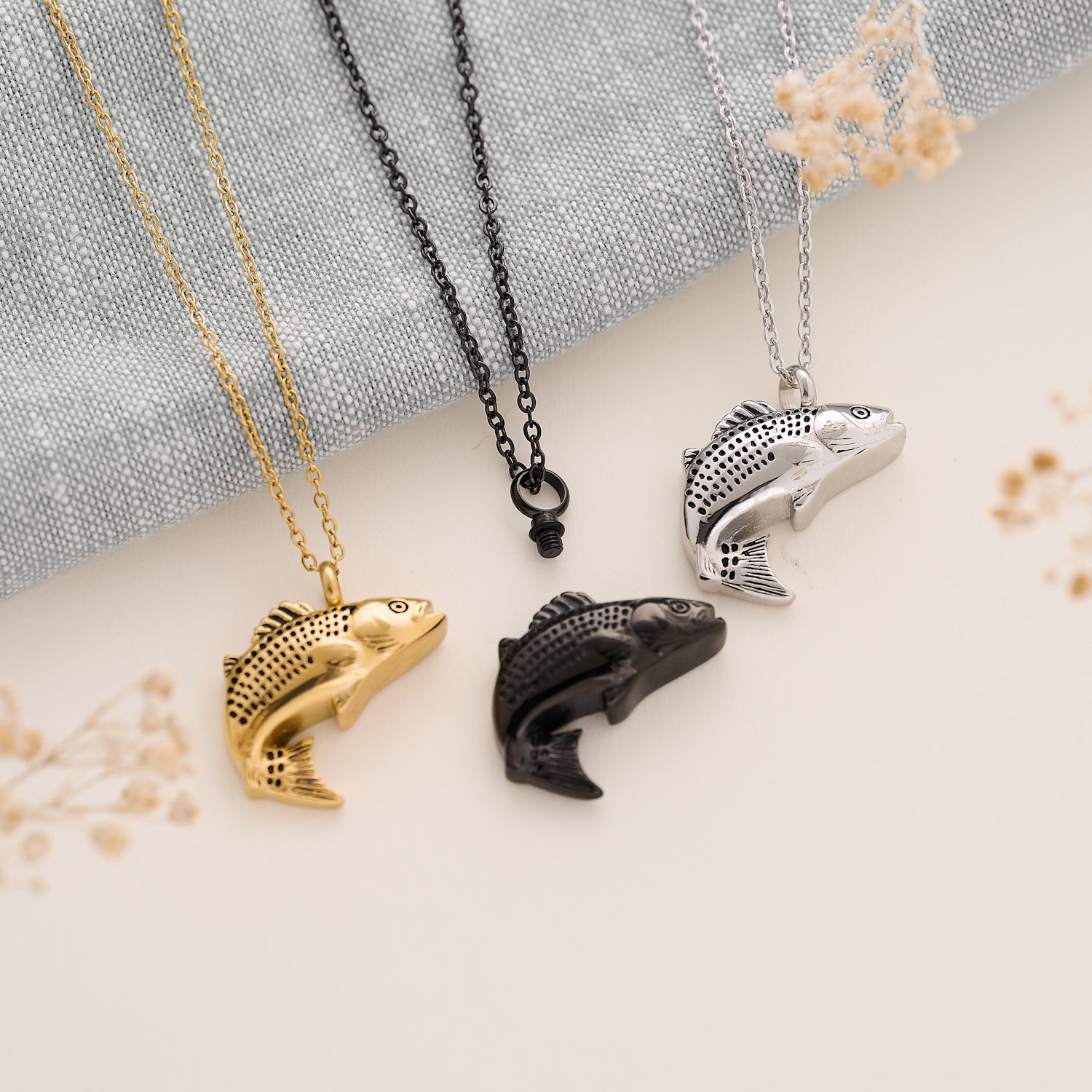 An Ashes Necklace with Fish Symbol 