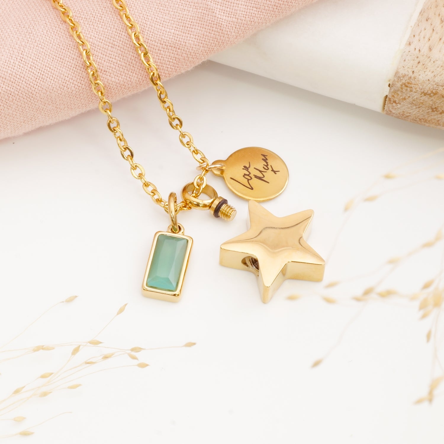 Close-up of star cremation necklace – engraved memorial pendant for stillborn loss or Mother's Day remembrance gift