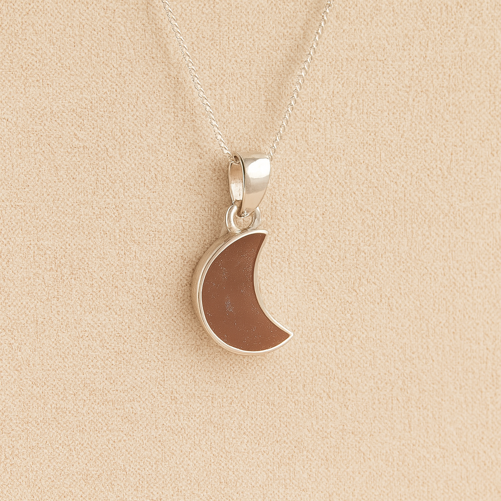 Silver Moon memorial Necklace with mocha resin, filled with ashes or fur, displayed on a soft beige background – suitable for pet or human memorials.
