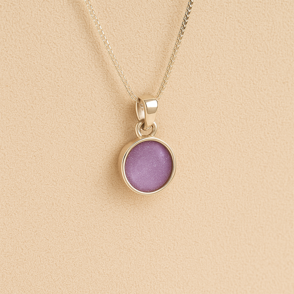 Silver Cremation ashes necklace with a round pendant and lavender resin filled with ashes or fur, displayed on a soft beige background – suitable for pet or human memorials.