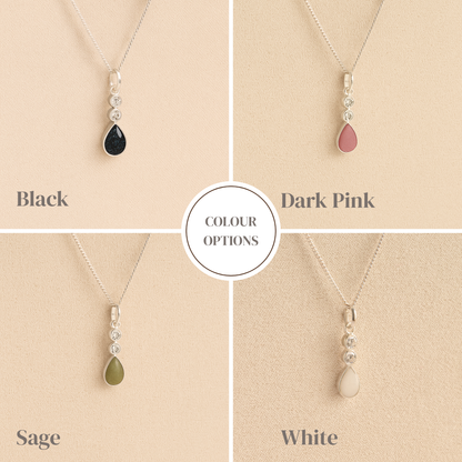 Silver Cremation ashes necklaces showing different resin colour options displayed on a soft beige background – suitable for pet or human memorials.