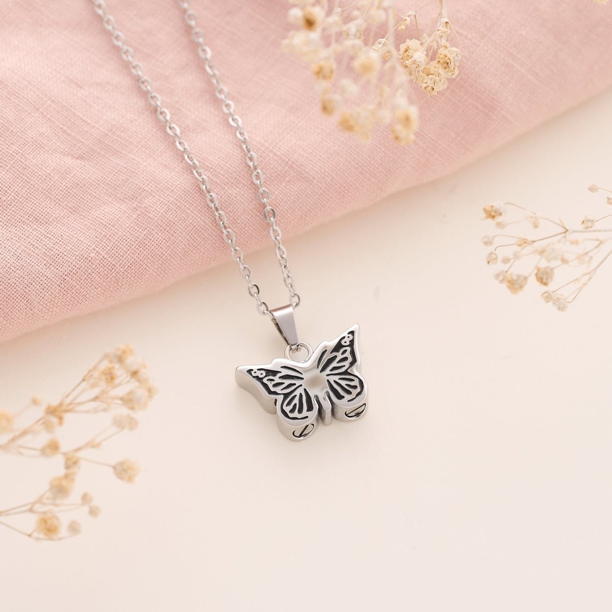 An Urn Pendant for Ashes in Butterfly Shape