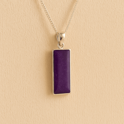 Men’s Cremation Ashes Rectangle Necklace with purple resin on a beige background