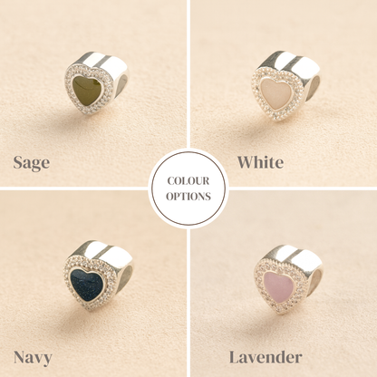 Colour examples of crystal heart ashes charm in sage, white, navy and lavender