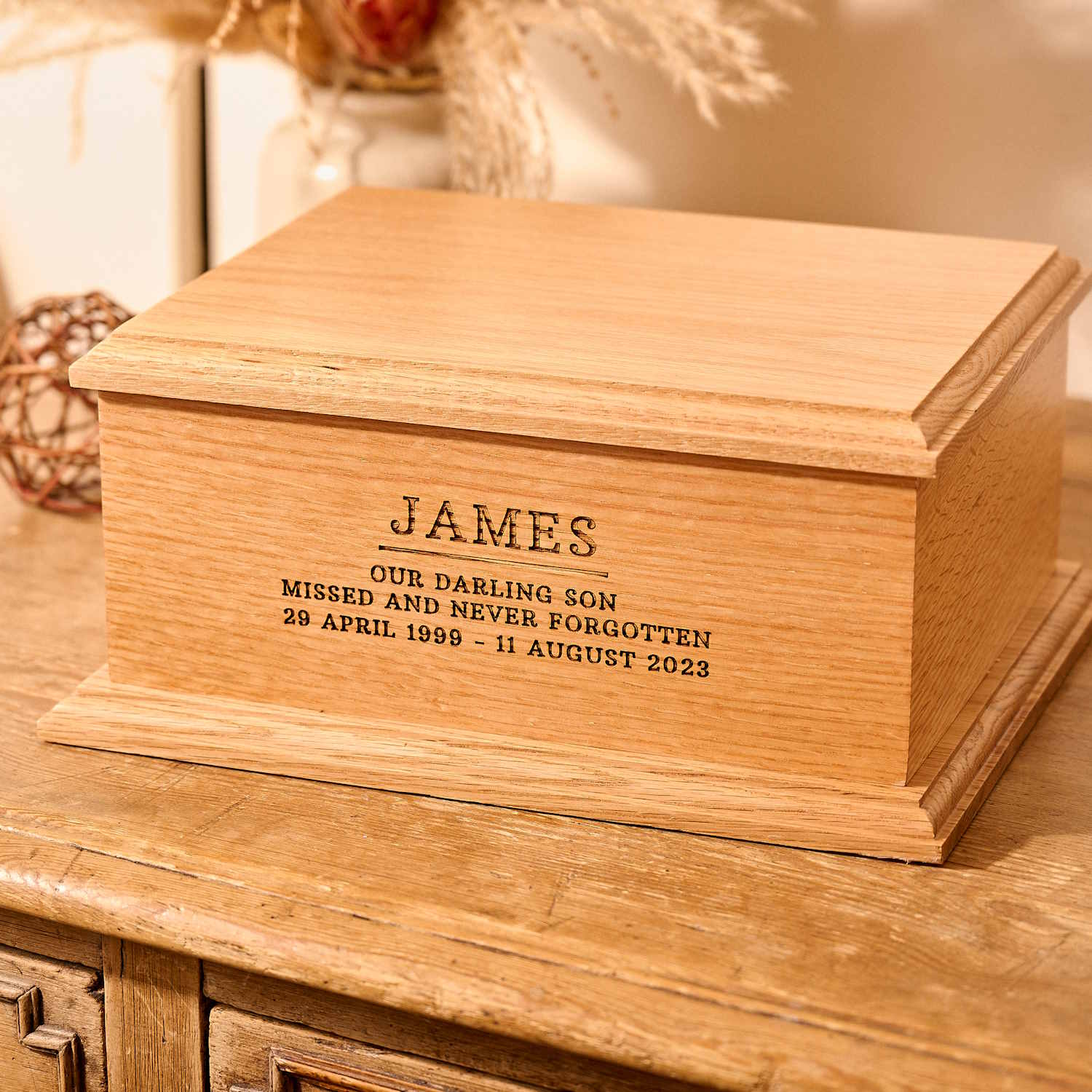 Handcrafted oak cremation urn with custom engraving – solid wood ashes keepsake