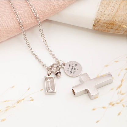 Close-up of cross cremation pendant – detailed view of memorial jewellery for stillborn loss or Mother's Day remembrance