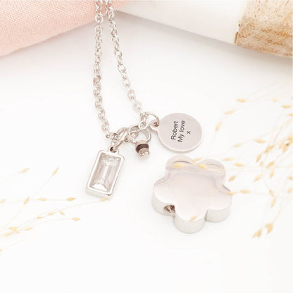 Close-up of floral cremation pendant – detailed view of memorial jewellery for stillborn loss or Mother's Day remembrance