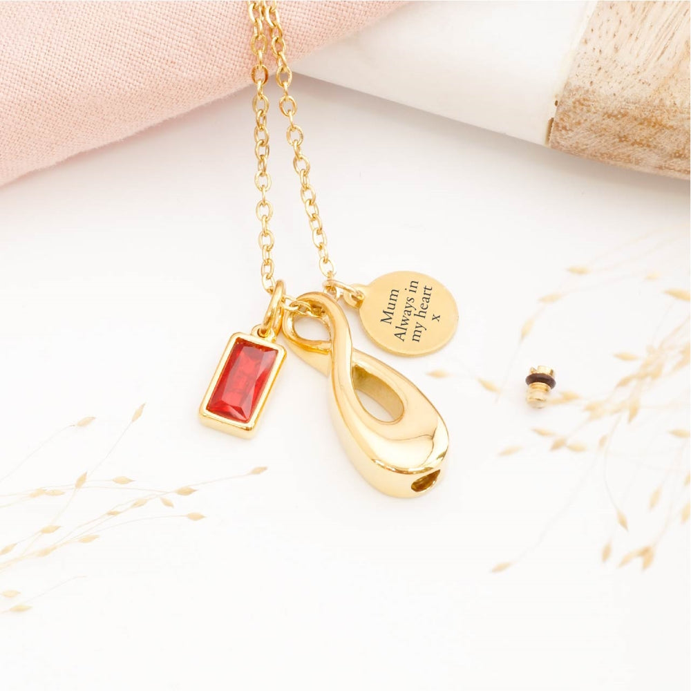 Close-up of infinity cremation pendant – detailed view of memorial jewellery for stillborn loss or Mother's Day remembrance
