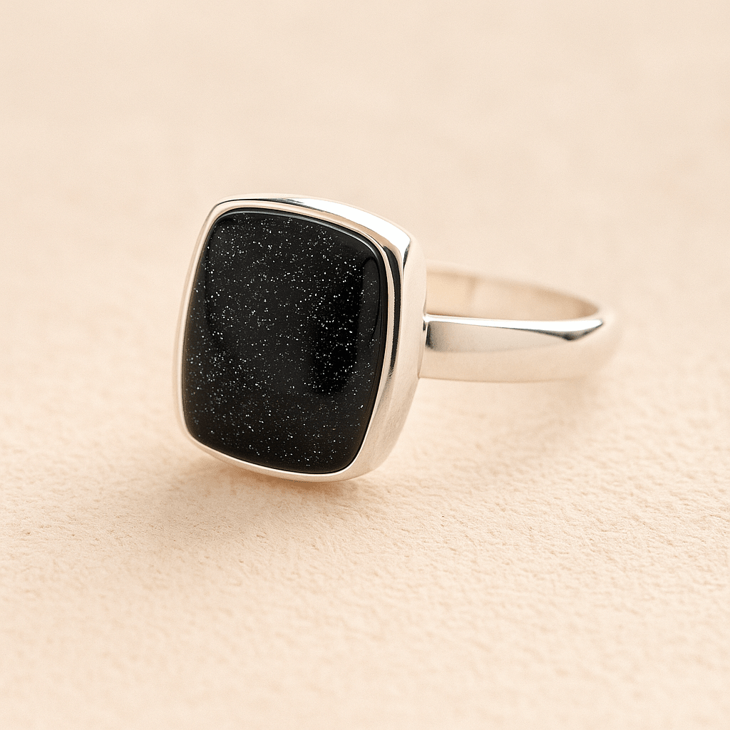 Silver Square Memorial Ashes Cremation Ring with black resin, filled with ashes or fur, displayed on a soft beige background – suitable for pet or human memorials.