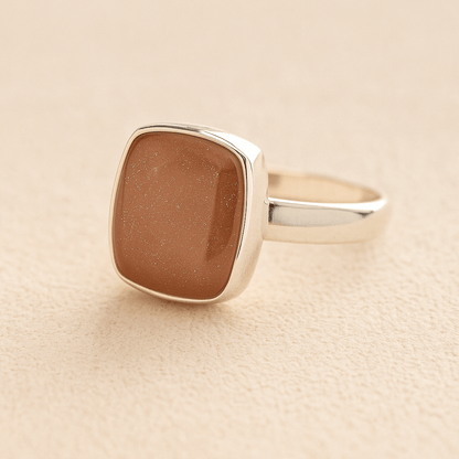 Silver Square Memorial Ashes Cremation Ring with mocha resin, filled with ashes or fur, displayed on a soft beige background – suitable for pet or human memorials.