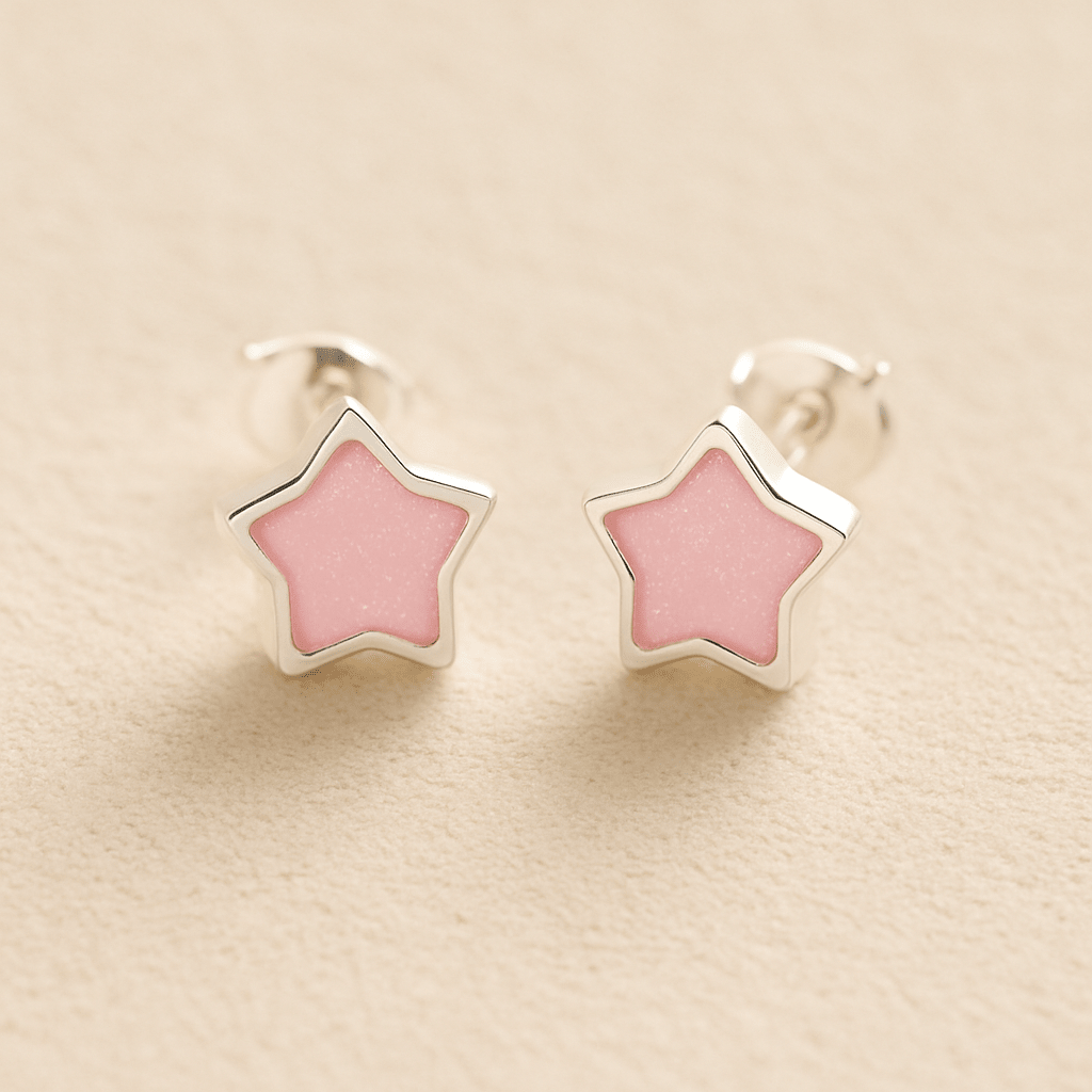 Silver Memorial Star-Shaped Ashes Earrings with light pink resin on a beige background