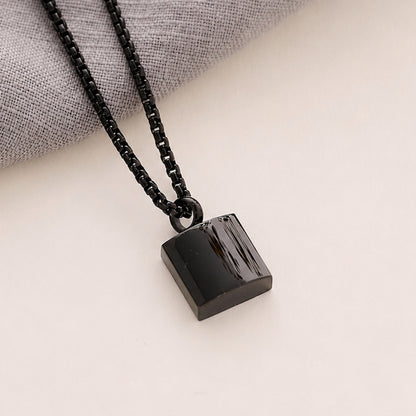 Black Men’s Square memorial Pendant on a beige background 