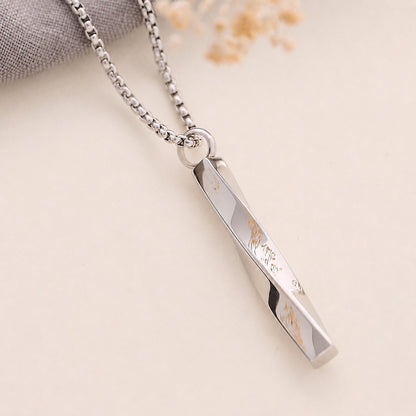 Silver twist memorial necklace on a light background