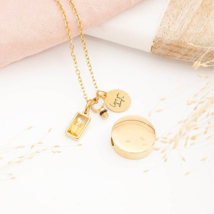 Handwriting necklace gold with self fill urn pendant and birthstone charm on a light background. Memorial Jewellery for him