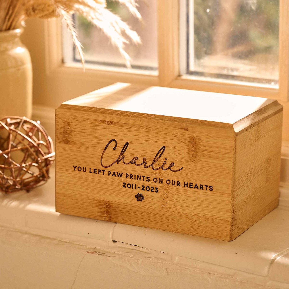 Personalised pet cremation urn in solid bamboo
