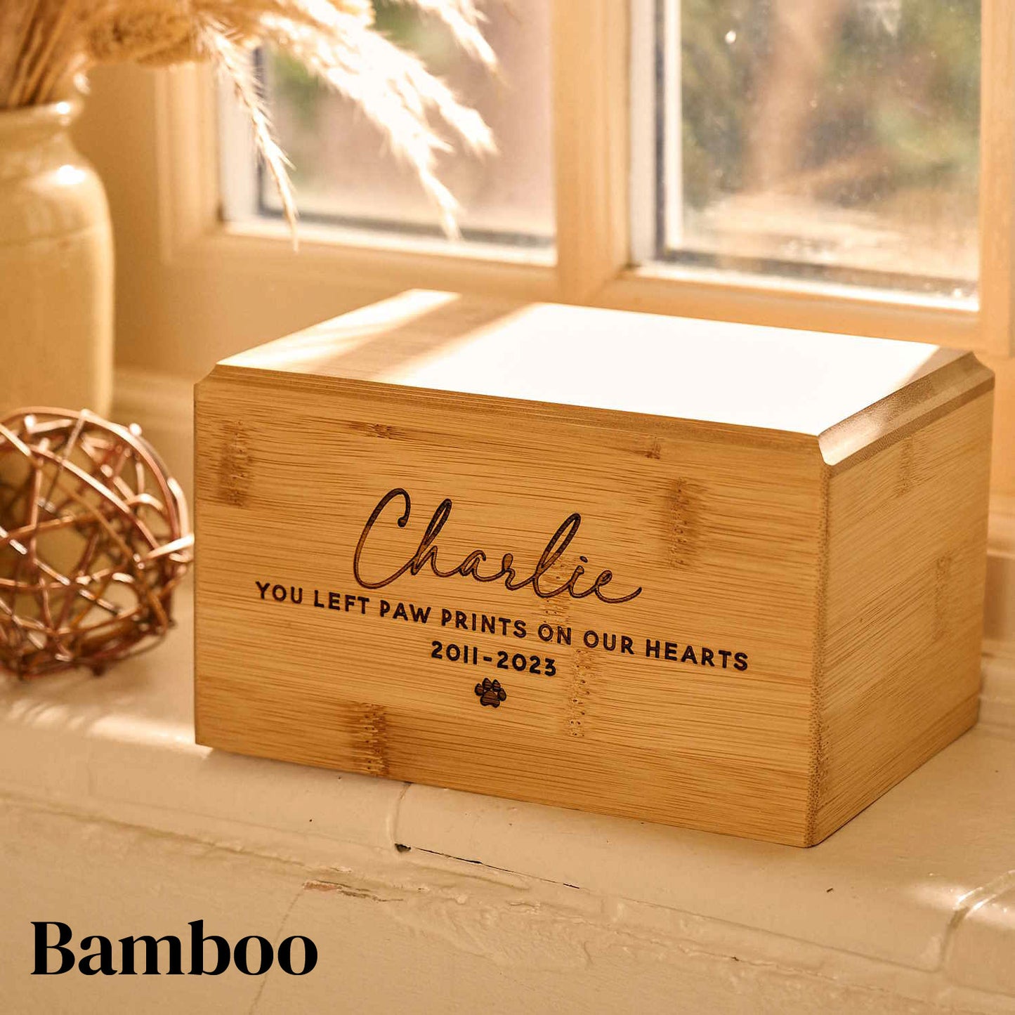 Handcrafted wooden urn for pet ashes with custom inscription