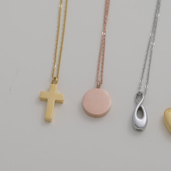 Personalised star cremation necklace with birthstone and engraved tag – a heartfelt memorial gift in motion.