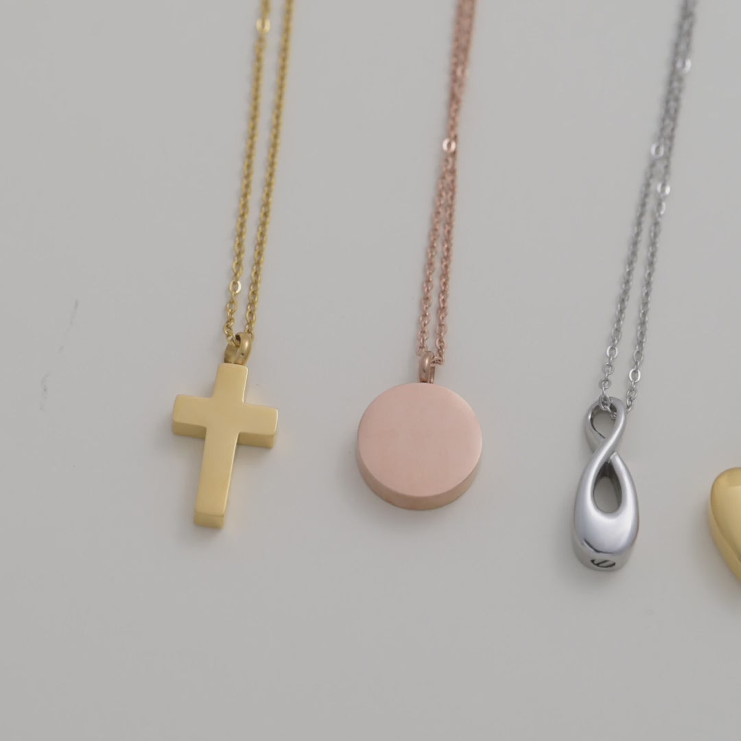 Personalised star cremation necklace with birthstone and engraved tag – a heartfelt memorial gift in motion.