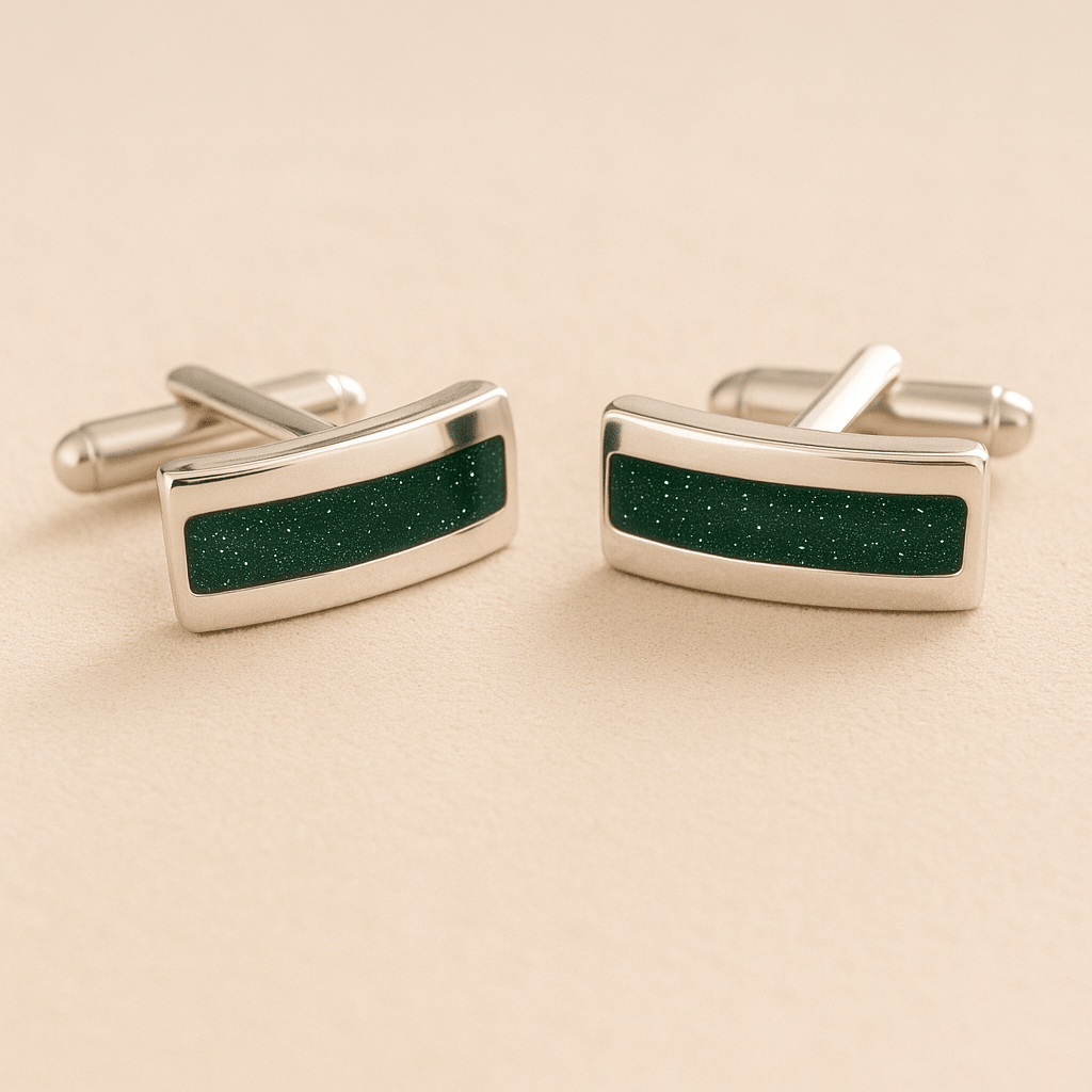Silver Curved Memorial cufflinks with dark green resin inlay with cremation ashes or fur on a beige background