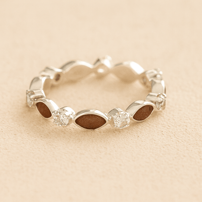 Silver cremation ashes ring with mocha resin and crystal accents, filled with ashes or fur, displayed on a soft beige background – suitable for pet or human memorials.
