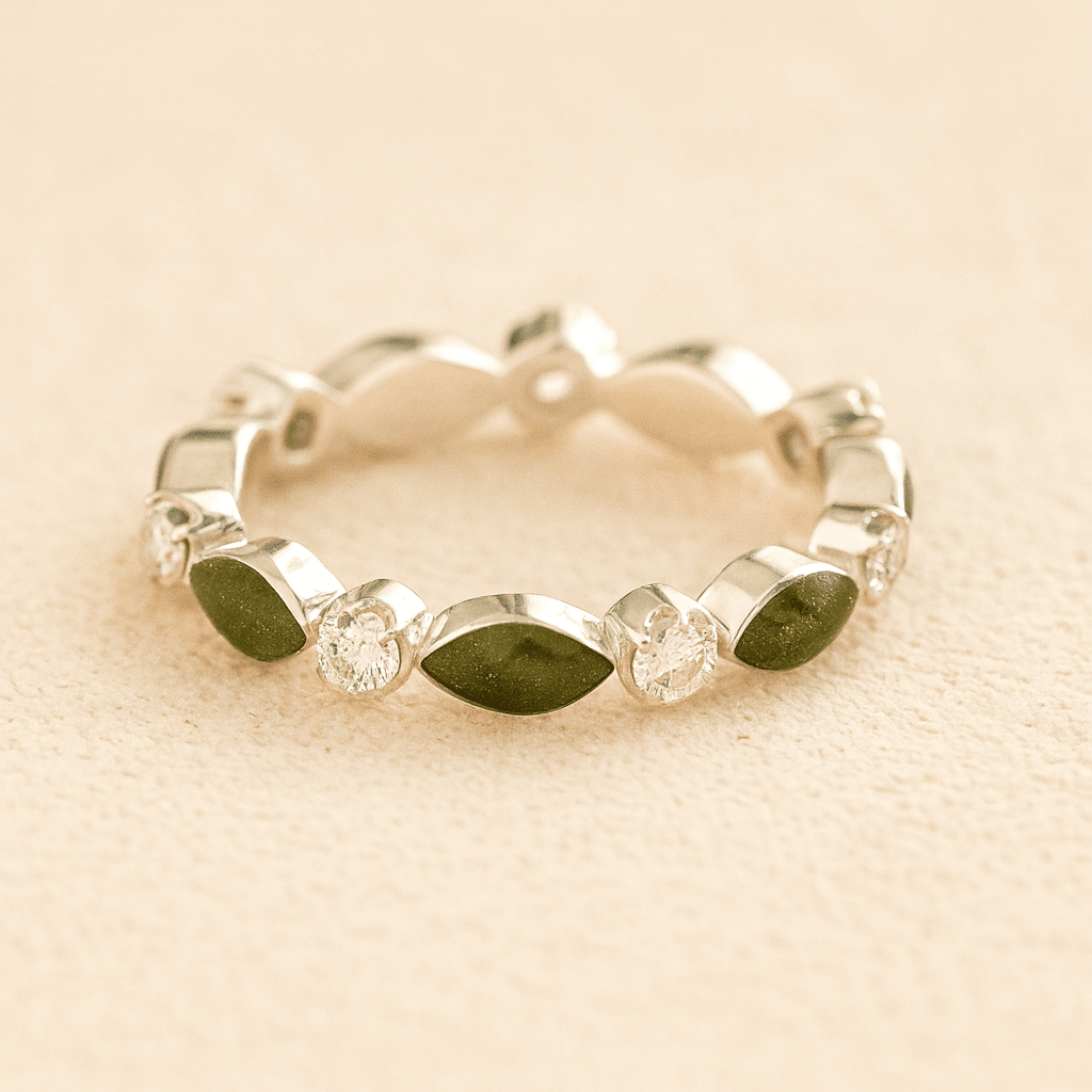 Silver cremation ashes ring with Sage resin and crystal accents, filled with ashes or fur, displayed on a soft beige background – suitable for pet or human memorials.