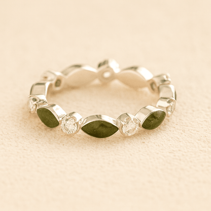 Silver cremation ashes ring with Sage resin and crystal accents, filled with ashes or fur, displayed on a soft beige background – suitable for pet or human memorials.