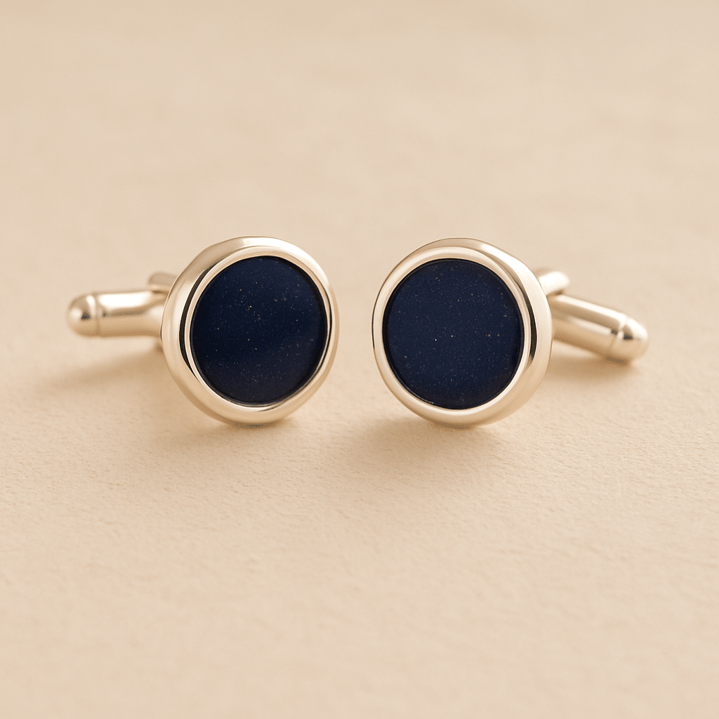 Silver Round Ashes Cufflinks with navy resin with ashes or fur on a beige background