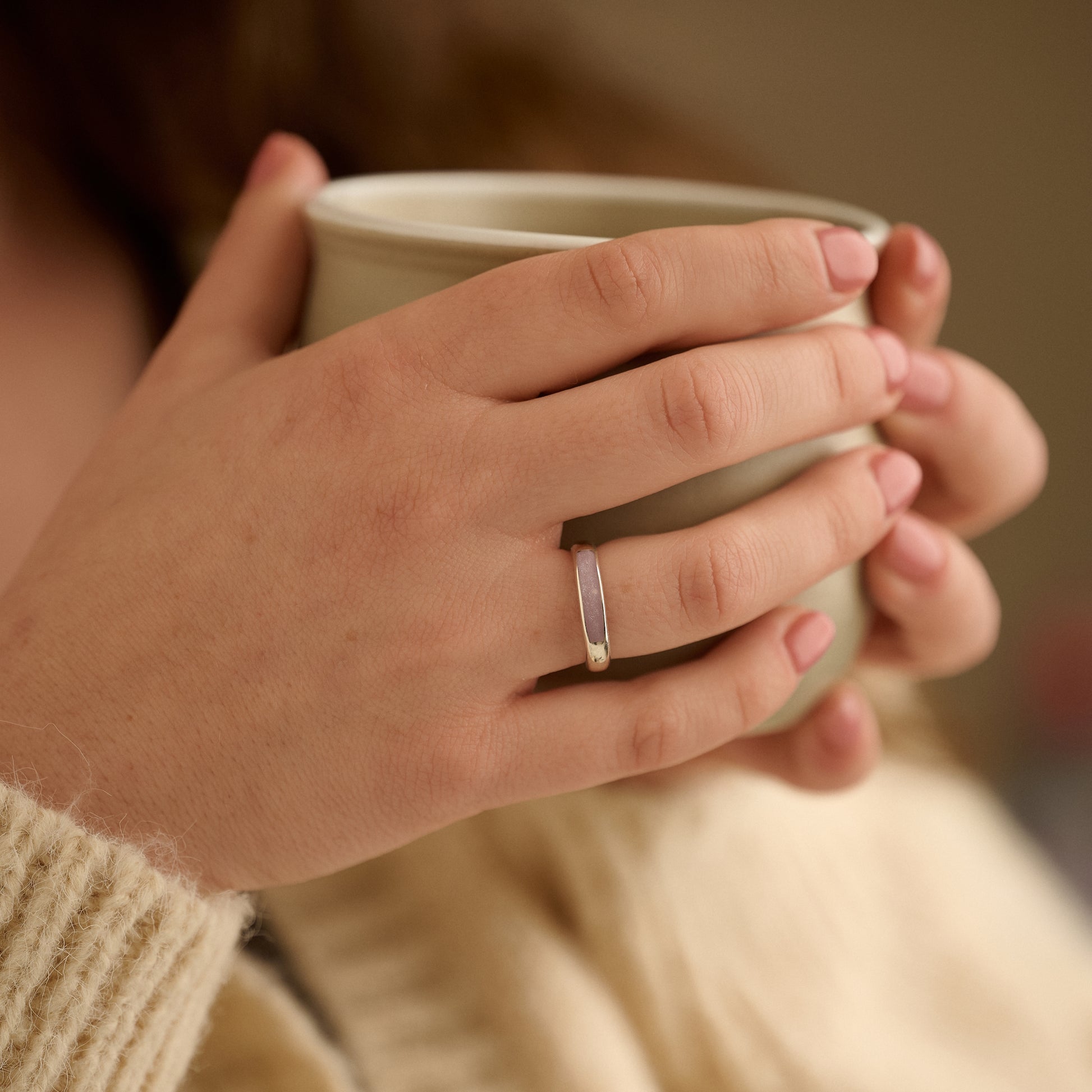Lavender cremation ring worn by woman, sterling silver remembrance jewellery