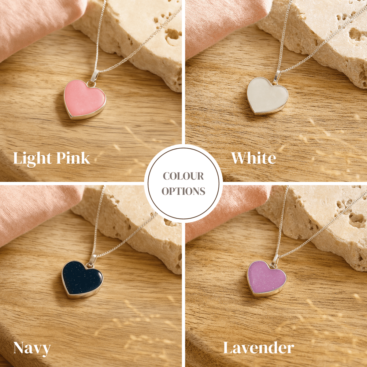 Heart-shaped ashes necklaces in light pink, white, navy, and lavender on a wooden surface.
