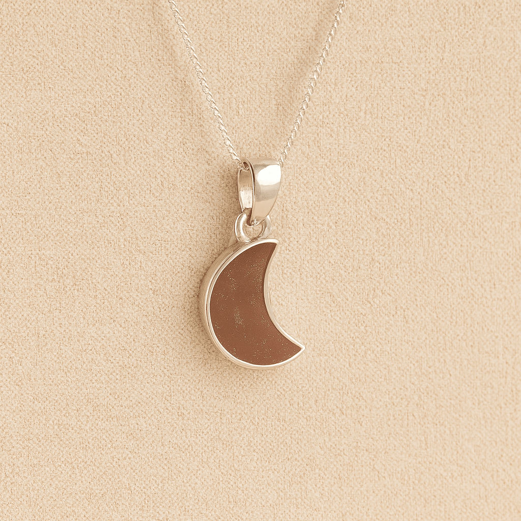 Silver Moon memorial Necklace with mocha resin, filled with ashes or fur, displayed on a soft beige background – suitable for pet or human memorials.
