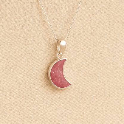 Silver Moon memorial Necklace with dark pink resin, filled with ashes or fur, displayed on a soft beige background – suitable for pet or human memorials.