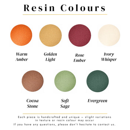 Examples of resin colours for cremation jewellery including amber, yellow, burgundy, white, mocha, sage and dark green