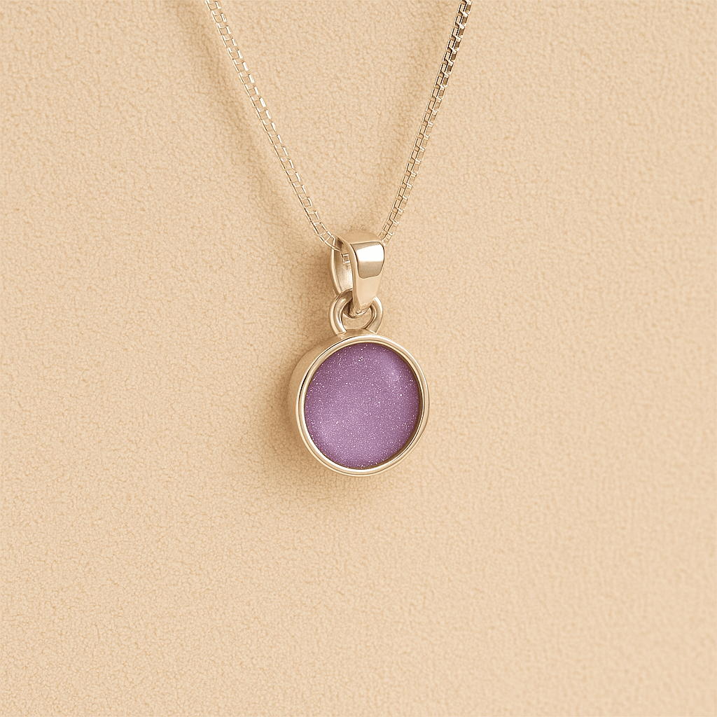 Silver Cremation ashes necklace with a round pendant and lavender resin filled with ashes or fur, displayed on a soft beige background – suitable for pet or human memorials.